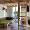 Photo 2: Sitting area with a Futon 