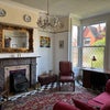 Photo 2: Sitting room faces front