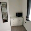 Photo 8: Tv and chest of drawers