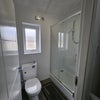 Photo 3: Shower and Toilet