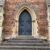 Photo 8: The main door to the church