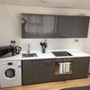 Photo 2: Kitchen Area