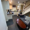 Photo 3: Living area / Table / Sofa 