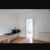 Photo 7: seperate room for laundry and utility closet with drying racks and steam iron