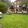 Photo 15: Large Communal Garden - sun loungers and  table and chairs