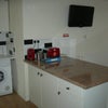 Photo 2: Kitchen area