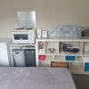 Photo 3: Compact kitchen area and fridge