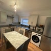 Photo 2: kitchen & shared living space