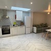 Photo 2: Living room and kitchen 