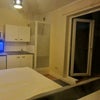 Photo 4: Kitchenette with sink, fridge and shower room