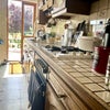 Photo 7: Kitchen with French doors leading onto balcony