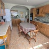 Photo 5: The shared kitchen