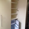 Photo 6: Storage cupboard with fridge / freezer 