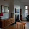 Photo 2: Front Room. Right View