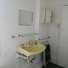 Photo 9: bathroom with bath and shower head