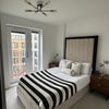 Photo 2: Bedroom - Bed, Cushion, Lamps, Included (Under storage bed) 