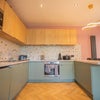 Photo 3: COMMUNAL KITCHEN