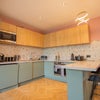 Photo 4: COMMUNAL KITCHEN