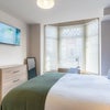 Photo 5: Ensuite double with tv