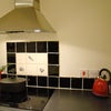 Photo 4: Kitchen hob with washing machine below