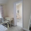 Photo 9: Entrance to en-suite bathroom