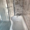 Photo 7: bathroom, one of two