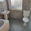 Photo 9: bathroom, one of two