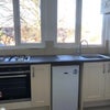 Photo 2: Kitchen with all appliances / Hob / Extractor / Oven / Microwave / Washing machine & Dryer / Fridge 