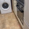 Photo 5: Kitchen with washing machine.