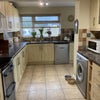 Photo 4: Kitchen (dining area to right out of view) 