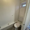 Photo 9: Downstairs Shared Toilet