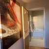 Photo 1: Hallway to bathroom