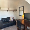 Photo 2: Sofa and desk in room 