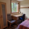 Photo 1: THE bedroom, with new window & floor