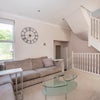 Photo 7: View of the living room and stairs leading up