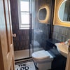 Photo 9: The bathroom you would use 