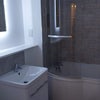 Photo 12: Stylish designer bathroom - bath & shower