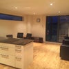 Photo 4: Open Plan Living Room With Access To Balcony