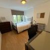 Photo 9: This is the smaller garden room 
