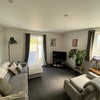 Photo 5: Shared living room space