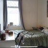 Photo 5: Room with street view