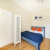 Photo 4: GF bedroom (rear)