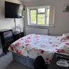 Photo 1: Fridge and 48in TV