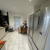 Photo 7: Kitchen and dining area