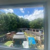 Photo 8: View over garden to reqr