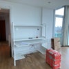 Photo 4: Available space for desk setup in living area (Desk Not Included)