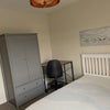 Photo 4: Double room with double bed, desk and wardrobe
