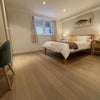 Photo 2: Massive bedroom with lots of open floor space