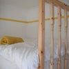 Photo 13: Yellow room - Bed