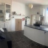 Photo 6: Kitchen and communal space